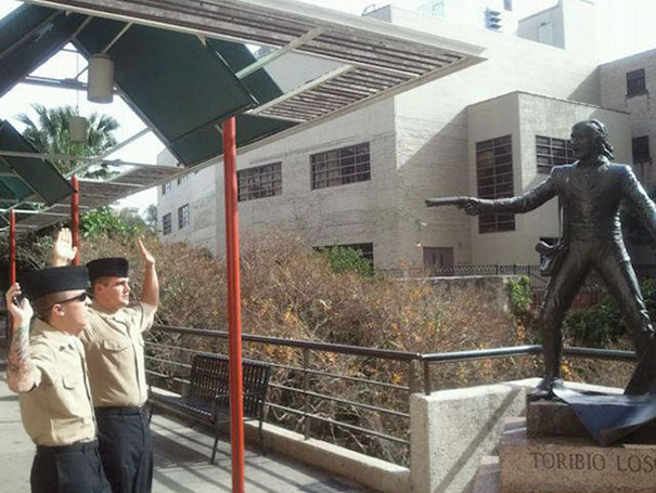 People Playing With Statues