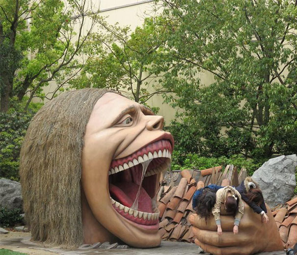 People Playing With Statues