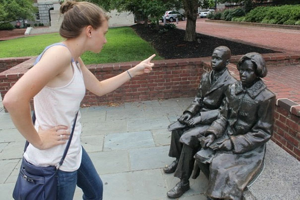 People Playing With Statues