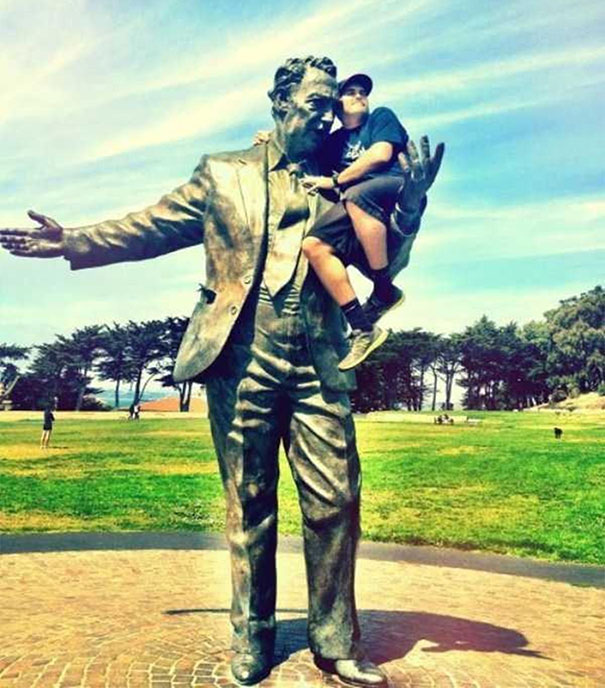 People Playing With Statues