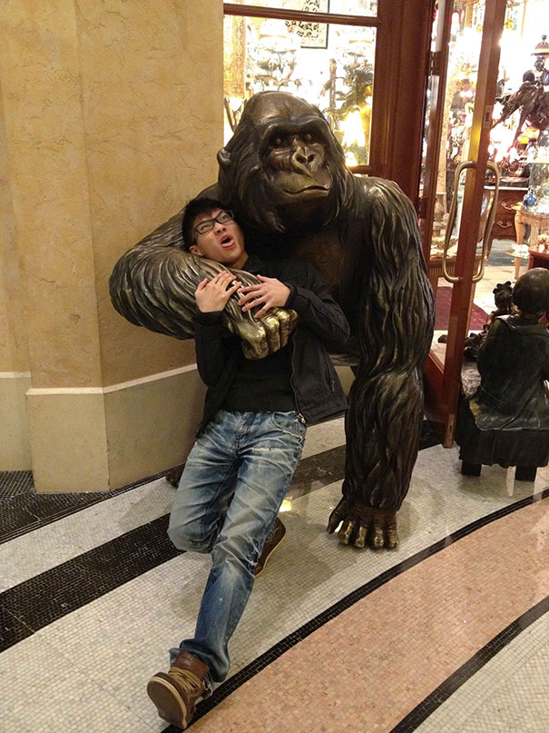 People Playing With Statues