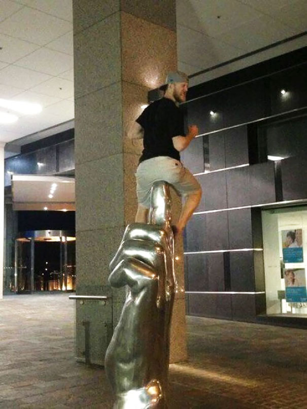 People Playing With Statues