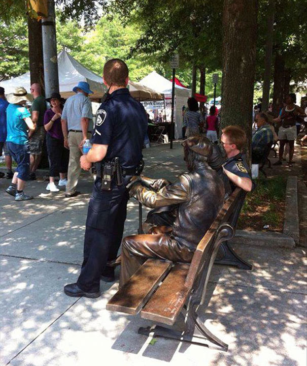 People Playing With Statues