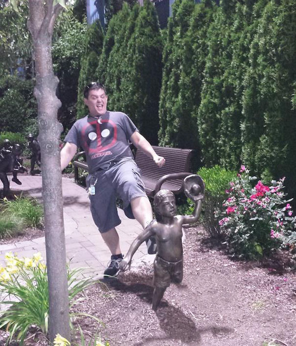 People Playing With Statues