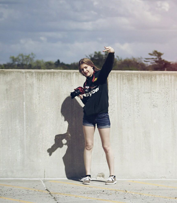 My Friends Shadow Looks Like She's Going Through The Photos On Her Camera