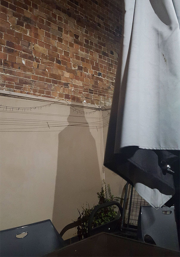 My Mates Backyard Umbrella Casts A Darth Vader Shadow