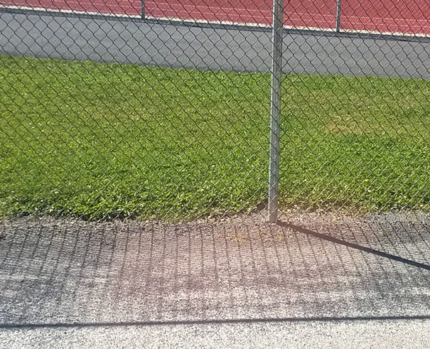 The Shadow Of The Diamond Fence Is Straight