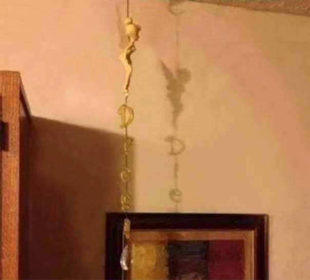 It's Supposed To Say 'Dream', The Shadow Says 'Die' And Looks Like Tinkerbell Hung Herself