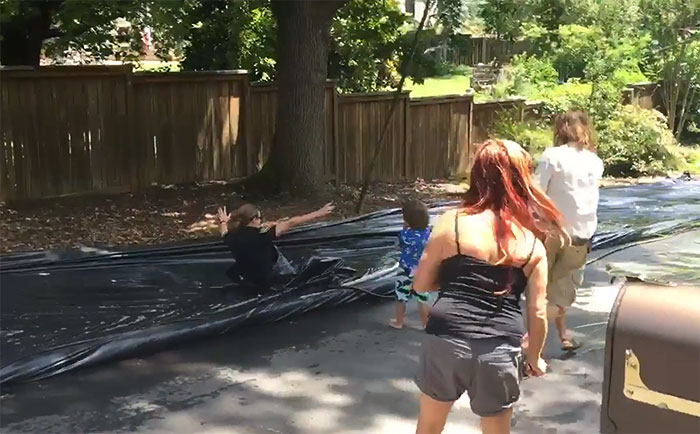 Neighbour Calls Police To Shut Down This Illegal Slip'N Slide, But Things Don't Go As Planned Neighbour Calls Police To Shut Down This Illegal Slip'N Slide, But Things Don't Go As Planned