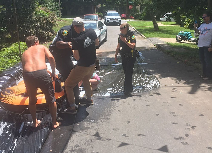 Neighbour Calls Police To Shut Down This Illegal Slip'N Slide, But Things Don't Go As Planned Neighbour Calls Police To Shut Down This Illegal Slip'N Slide, But Things Don't Go As Planned