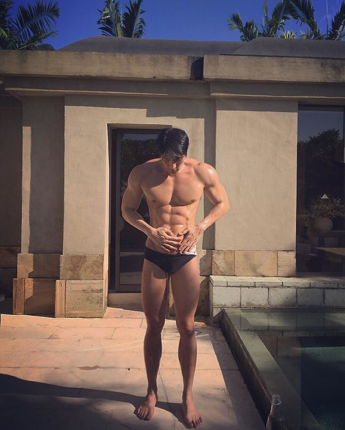 59-year-old man with the body of a 20-year-old sunbathing outdoors, showcasing a muscular and toned physique. 59-year-old man with the body of a 20-year-old sunbathing outdoors, showcasing a muscular and toned physique.