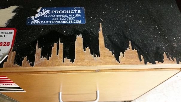 The Tear-Out On This Veneer Looks Like A City Skyline