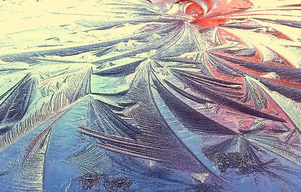 The Sunrise Shining Off The Icy Roof Of My Car