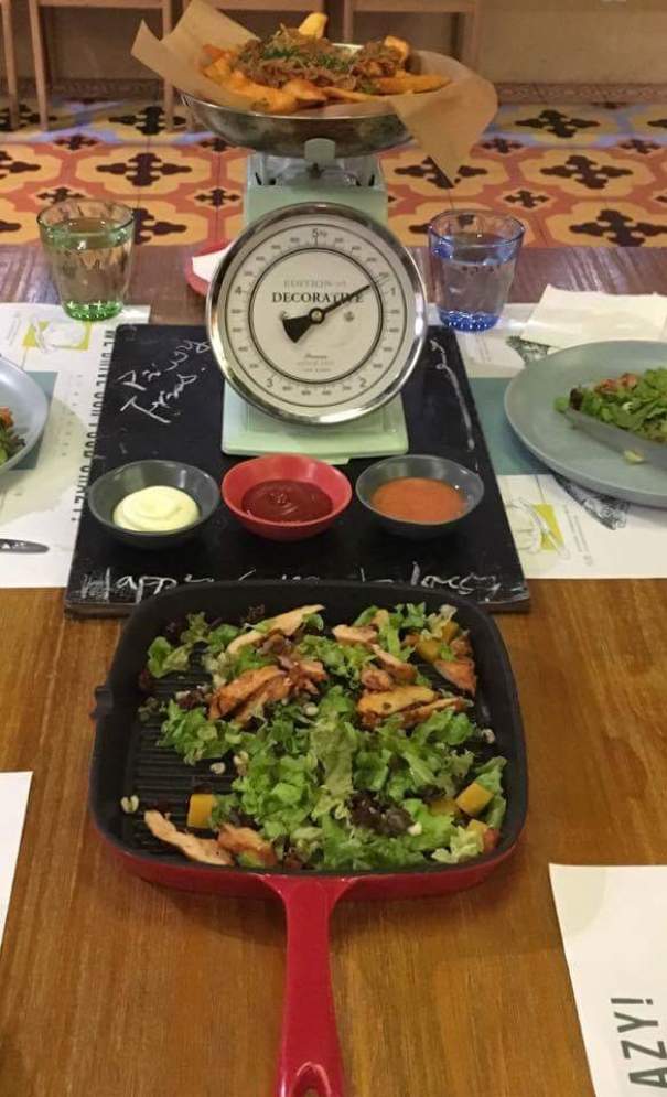 Fries Served On A Weight And Salad In A Grillpan