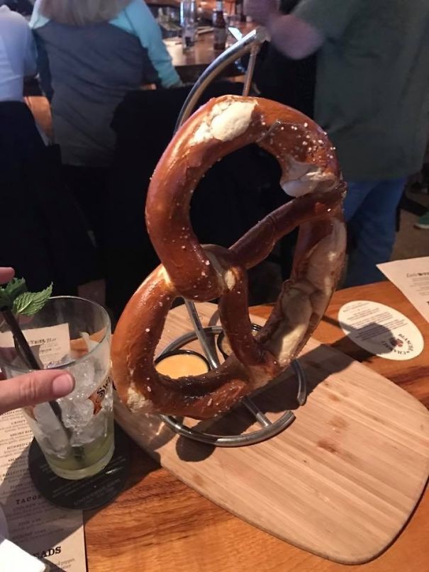 Pretzel On A Banana Stand On A Plank Of Wood