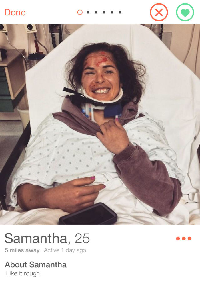 Smiling woman in hospital gown featured in a funny Tinder profile for humorous effect.