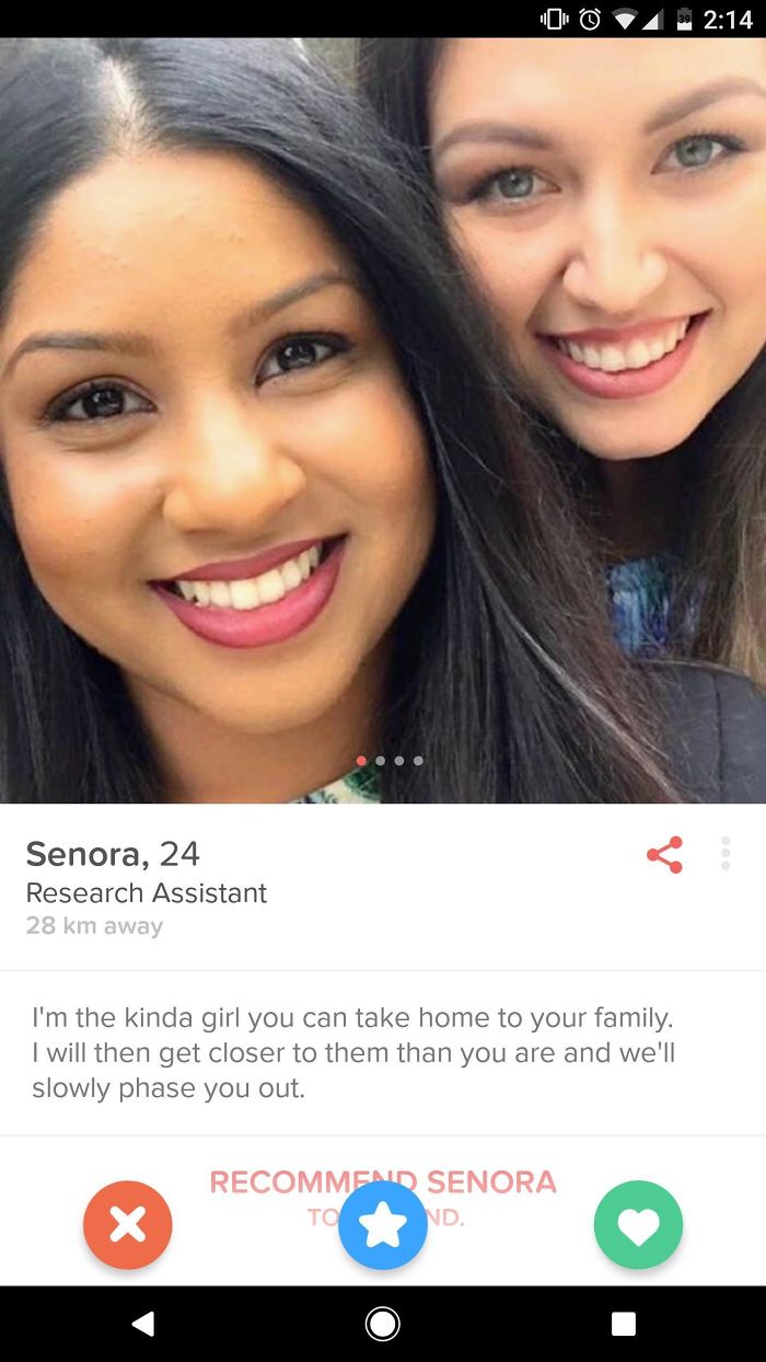 Two women smiling for a Tinder profile photo with a humorous bio.