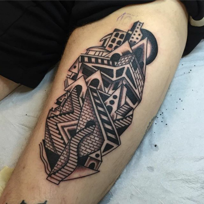 Geometric architecture tattoo on leg showcasing intricate building designs.