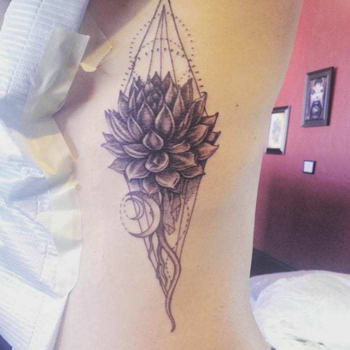 Succulent tattoo design on skin, showcasing intricate details and geometric patterns.