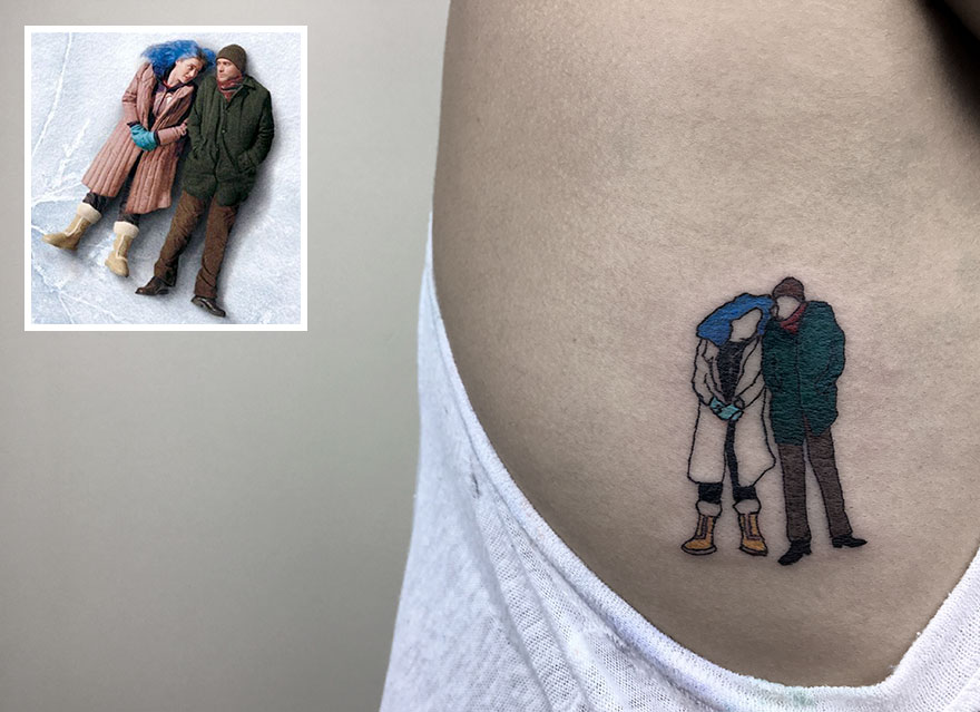 Tattoo of a cozy couple in winter clothing, inspired by a photograph, highlighting dedication to tattooing.