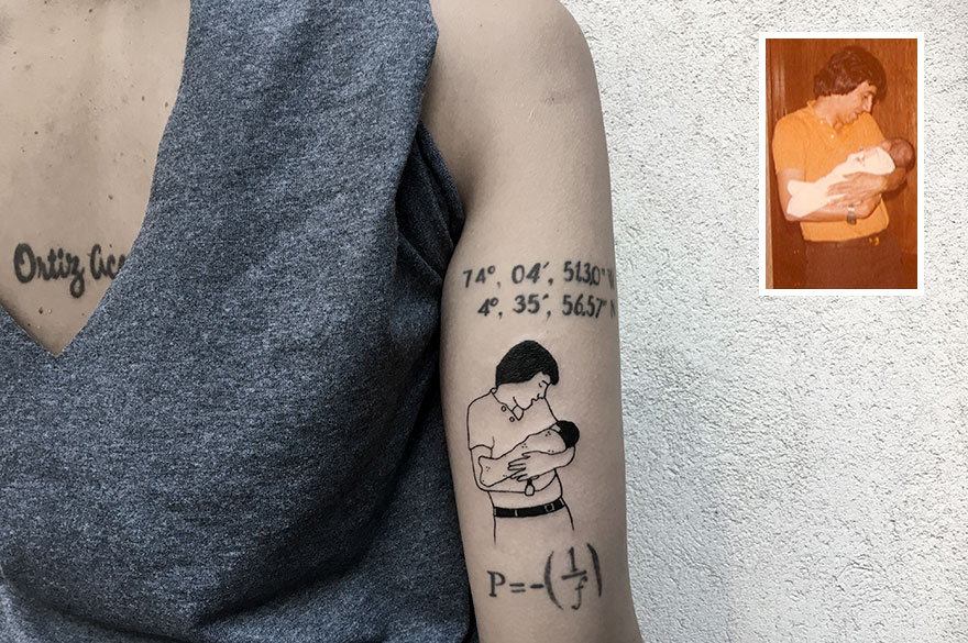 Tattoo showing a parent holding a baby in an arm, dedicated tattoo art next to old photo.