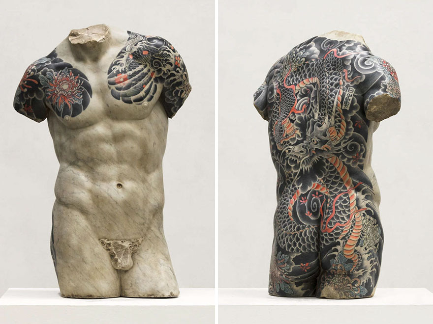 Classical sculpture with detailed tattoos by Italian artist Fabio Viale, showcasing intricate dragon and floral designs. Classical sculpture with detailed tattoos by Italian artist Fabio Viale, showcasing intricate dragon and floral designs.