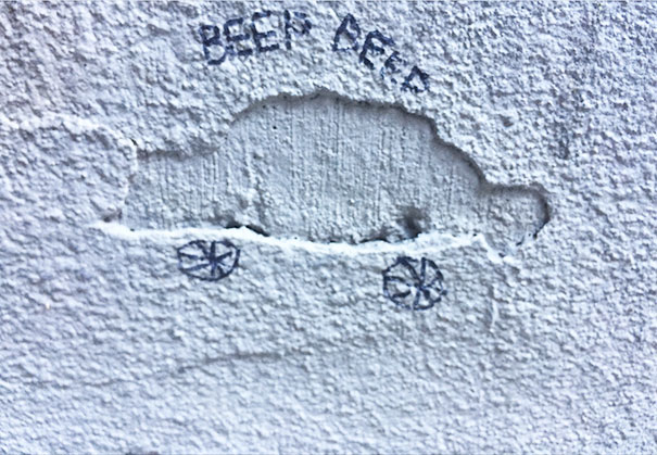 Seen Outside The Parking Garage At Work. Someone Took Advantage Of The Eroding Concrete