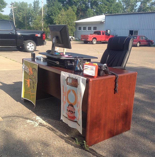 A Friend Put Hand Lotion On Some Coworkers' Office Door Handles Yesterday. This Is Where He Found His Desk This Morning