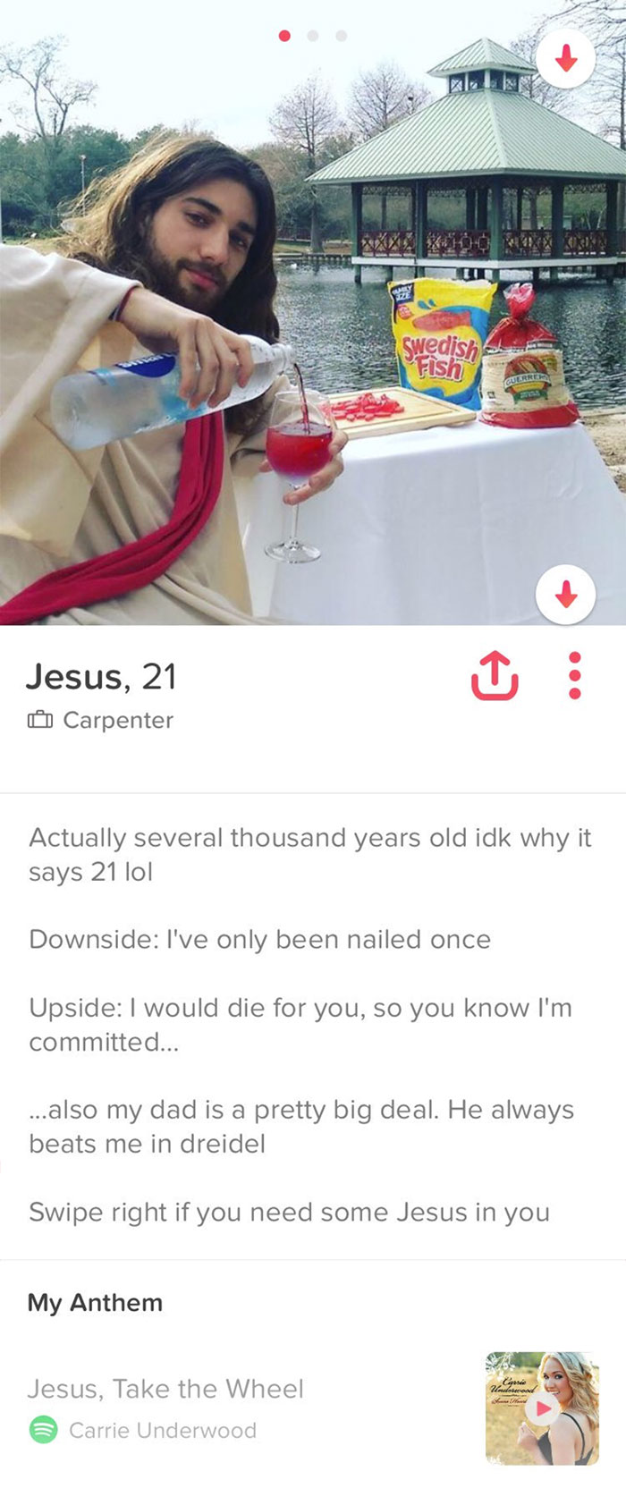 Humorous Tinder profile featuring a person dressed as Jesus, pouring a drink by a pond.