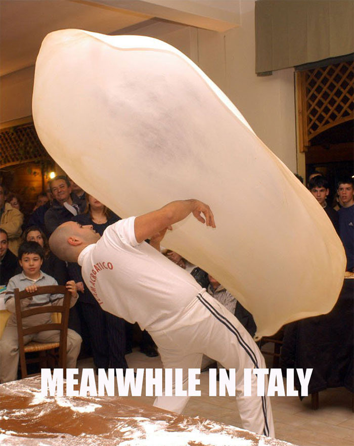 Man making huge pizza 