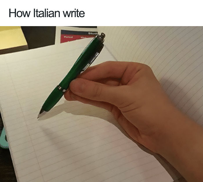 Person holding a pen with italina gesture 
