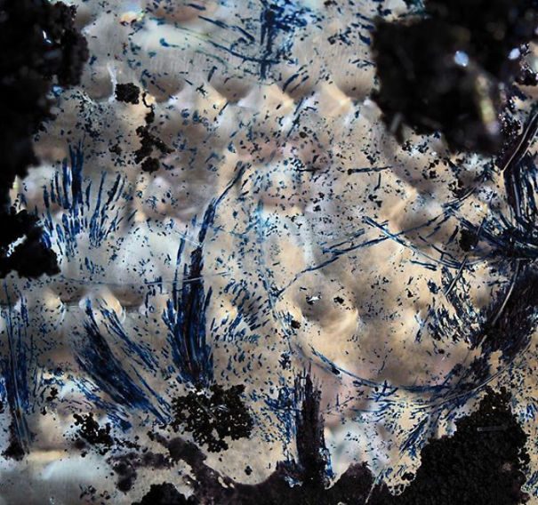 The Bottom Of A Dried Up Bottle Of Ink