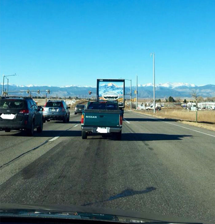 Truck Lines Up With Rocky Mountains