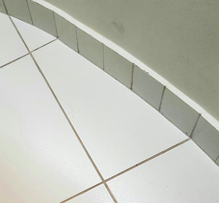 The Floor Tiles In My Workplace Are Masterfully Aligned