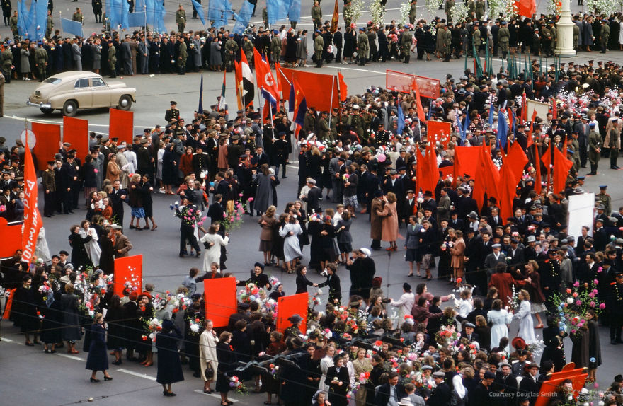 Flowers, Dancing, And North Korean Flags At A Parade In Moscow