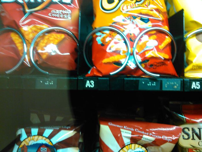 Braille Behind Vending Machine Glass