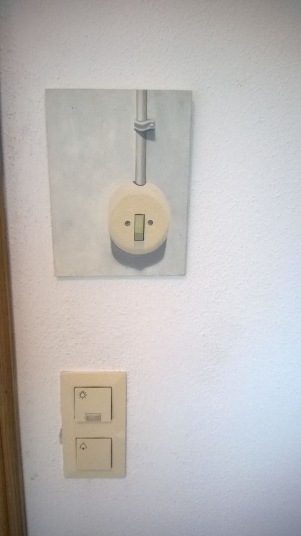 My Neighbour Has A Picture Of A Lights Witch Above His Light Switch