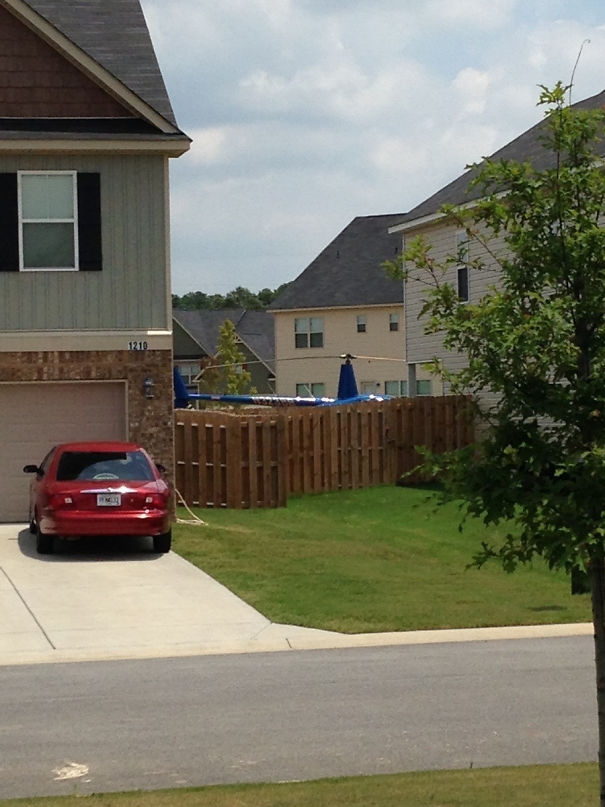 There Is Currently A Helicopter In The Neighbor's Yard
