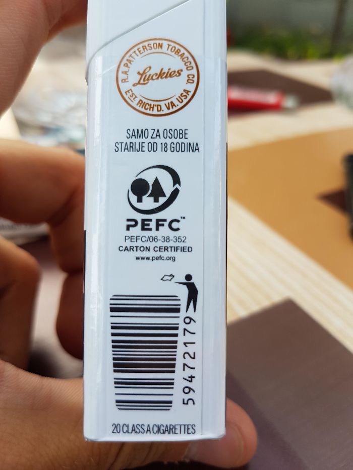 A Barcode On A Cigarette Box Inviting You To Recycle