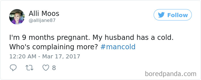 Tweet humorously contrasts a husband's cold with wife's pregnancy, using hashtag #mancold.