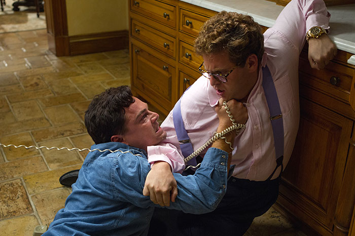 Scene from The Wolf Of Wall Street movie showing intense confrontation, related to fun facts about movies and Kate Winslet.