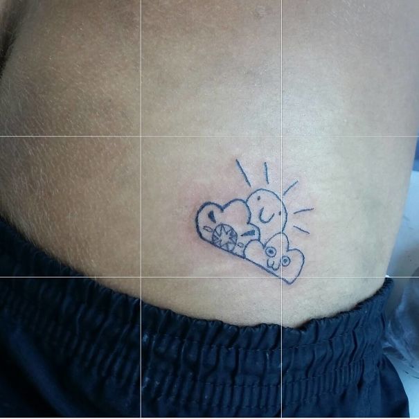 Simple sun and cloud tattoo by Brazilian artist, known for unique drawings, on a person's skin.