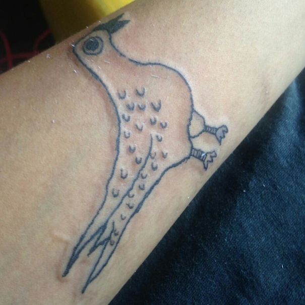 Simple bird tattoo on arm by Brazilian tattoo artist.
