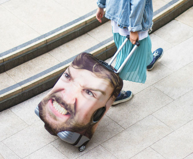 People Are Laughing At This Luggage Cover That Uses Giant Pic Of Your Face But It’s Actually Genius