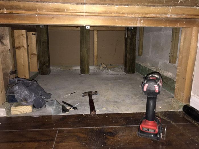 Man Builds Entire Bedroom Under Stairs For His Dog