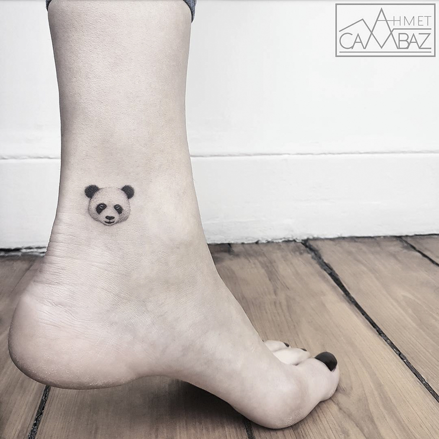 Minimalist panda tattoo on ankle by former Turkish cartoonist, Ahmet Cambaz.