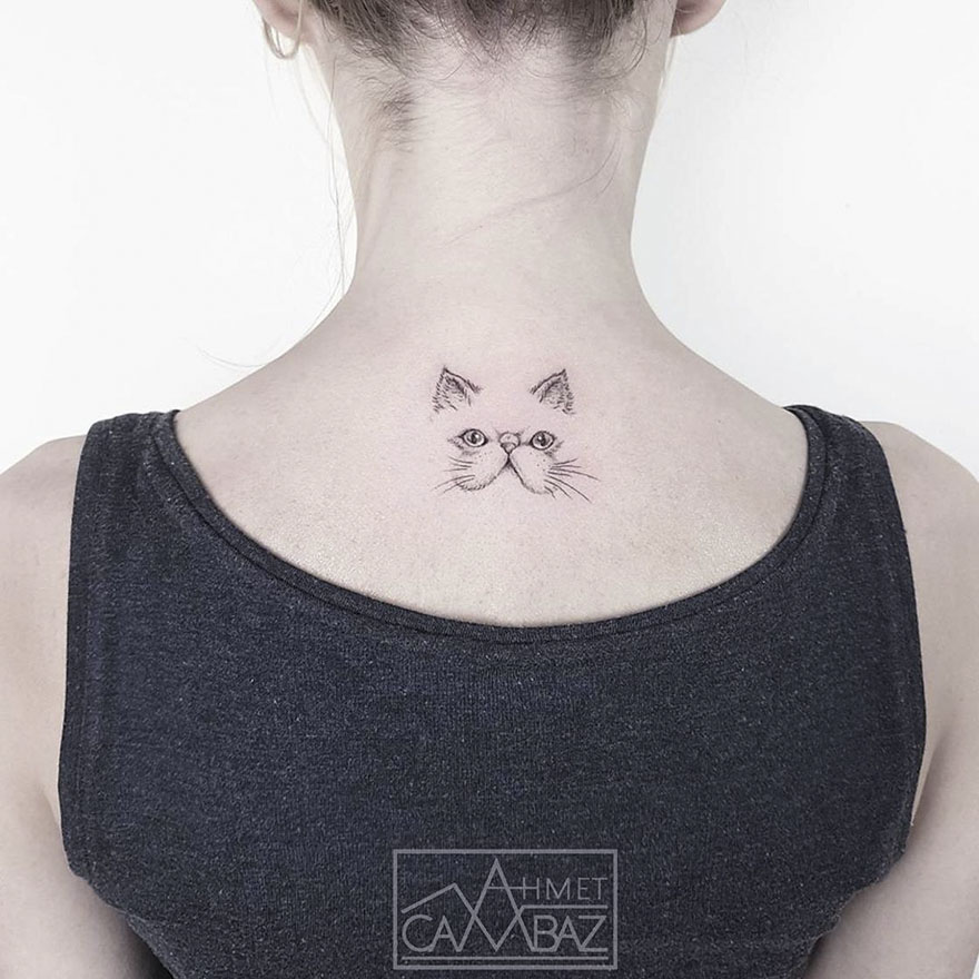 Minimalist cat tattoo design on a person's neck, created by a former Turkish cartoonist.