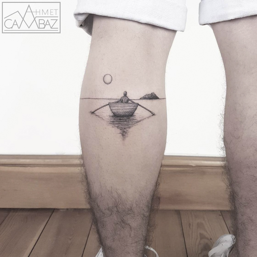 Tattoo by former Turkish cartoonist: minimalist boat and landscape inked on leg.
