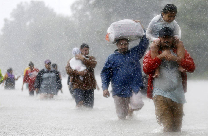 Residents Wade Through Flood Waters From Tropical Storm Harvey In Beaumont Place