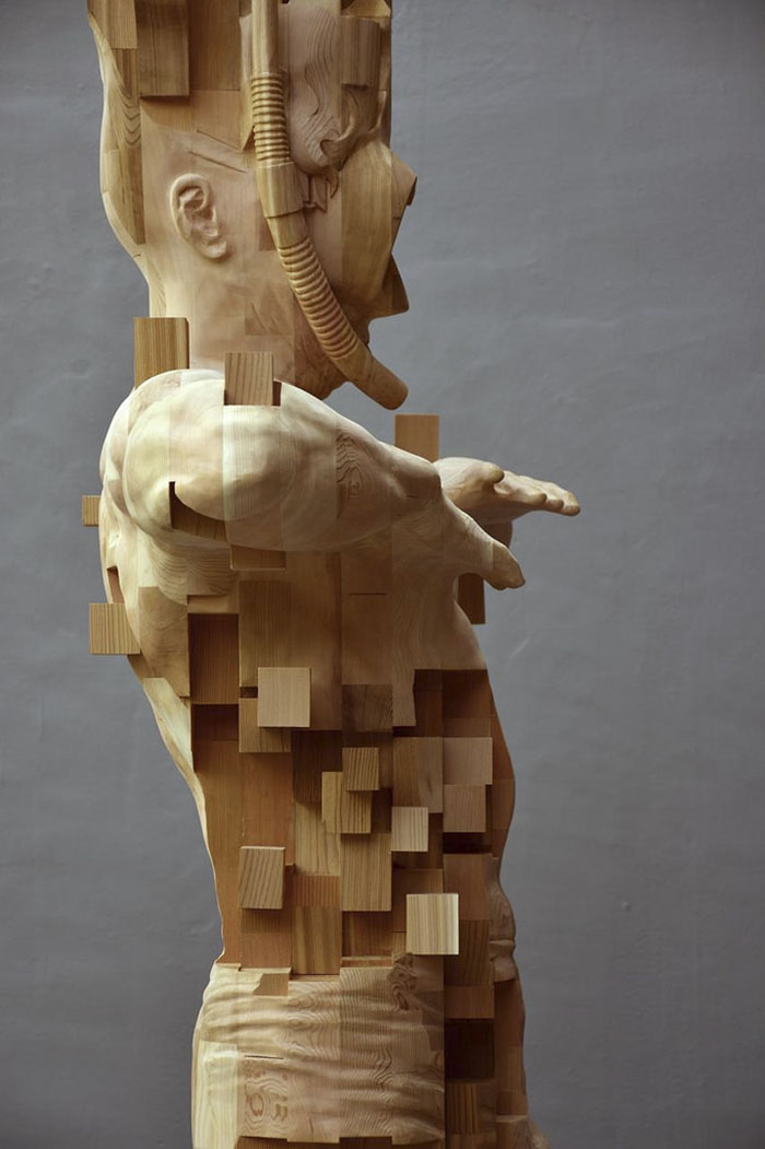 These Pixelated Sculptures That Look Like Computer Glitches Are Actually Made From Wood